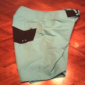 Under Armour board shorts.